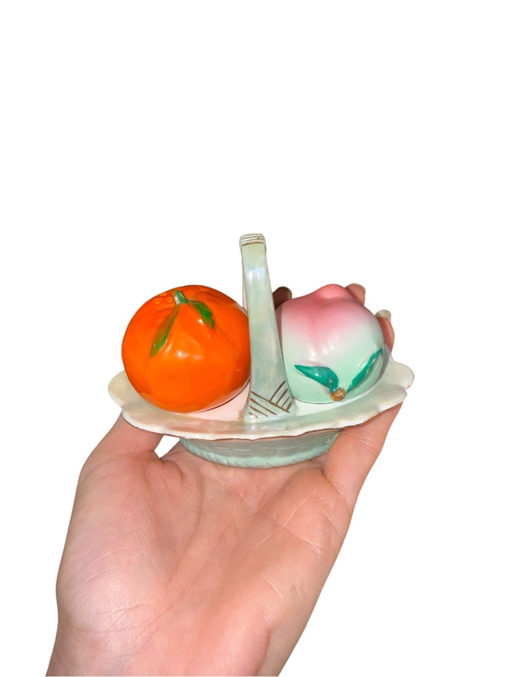 vintage peach and orange in a basket salt and pepper shackers